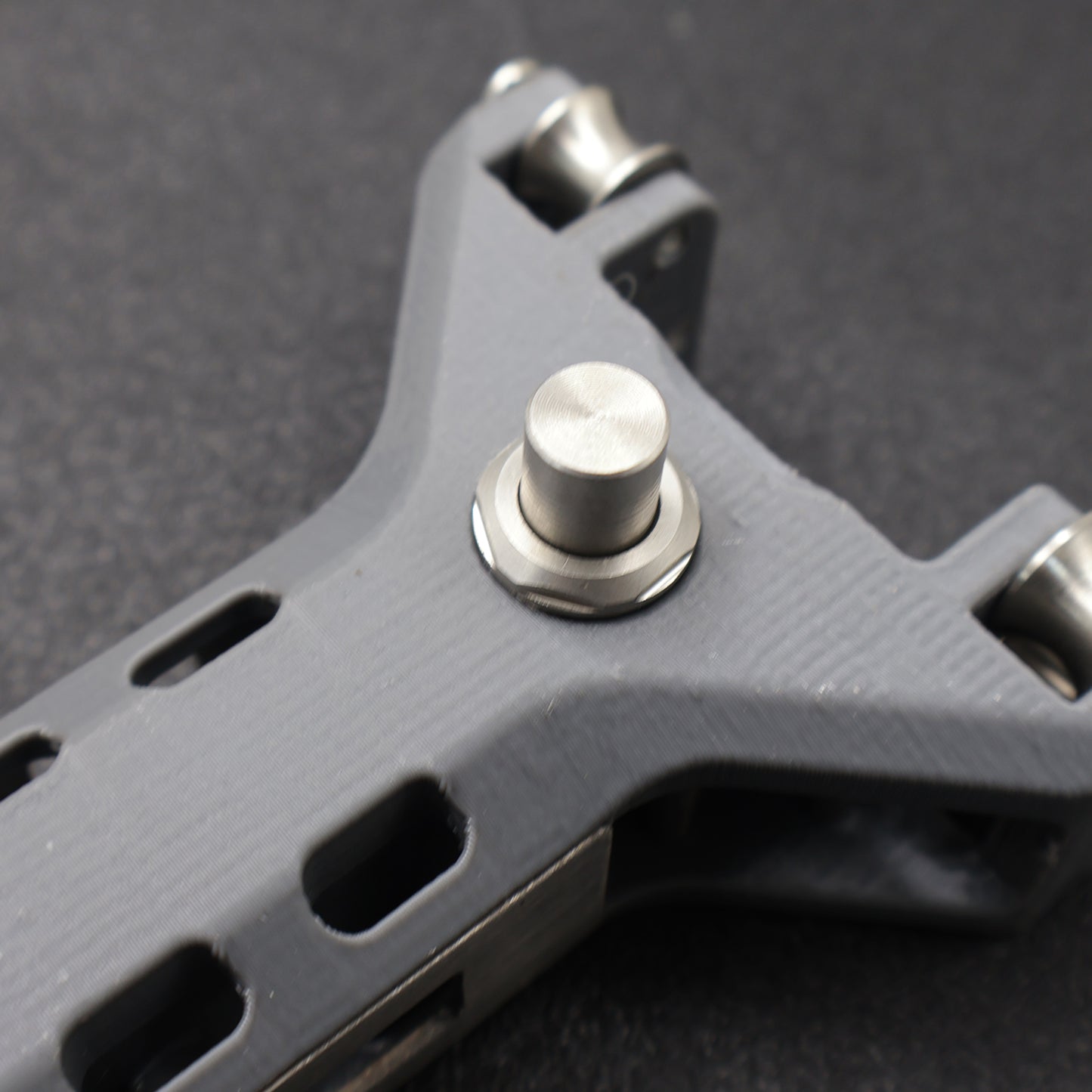 3D Printed Gray Hollow Repeating Slingshot (convex screws)